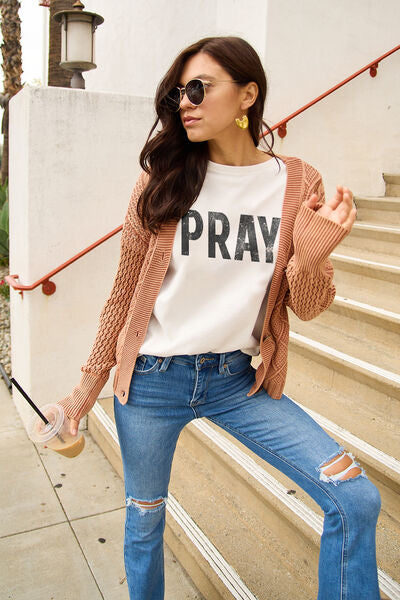 🙏 Wrap Yourself in Hope and Blessings with Our PRAY Tee in Radiant White! 🌟